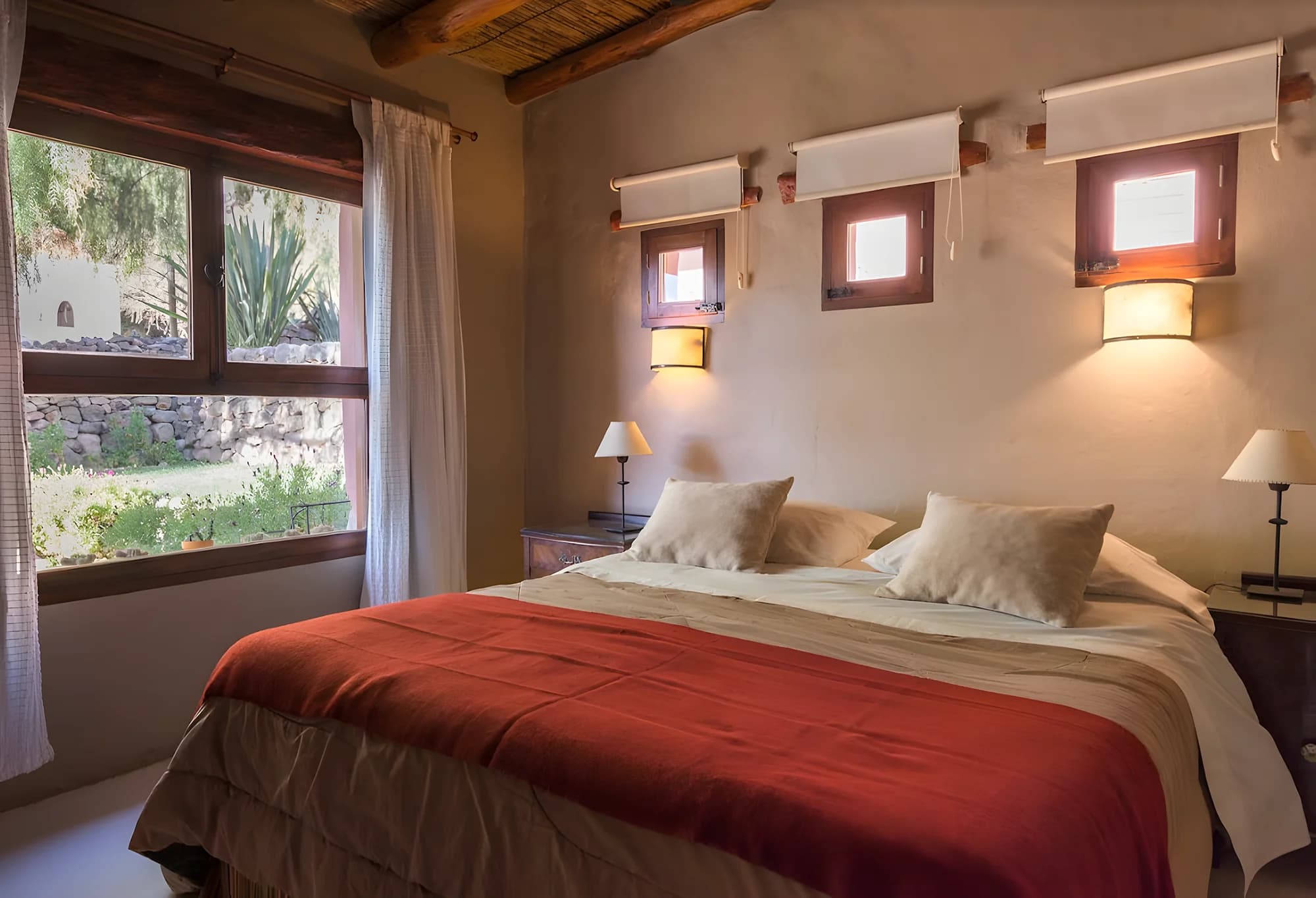 Cabin bedroom with King bed and garden view
